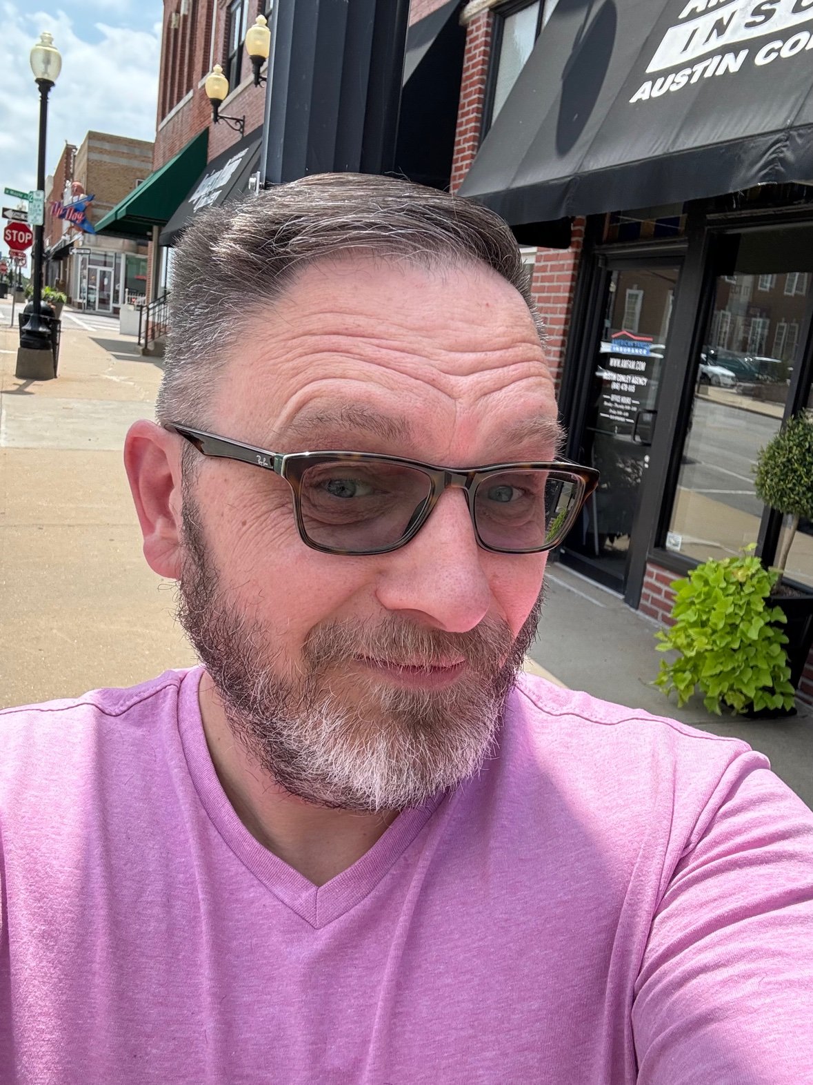 Charlie in a pink tee
