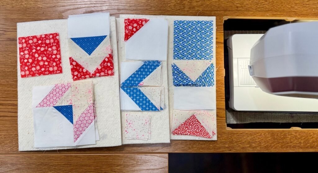Starfish units stacked on a board by the sewing machine